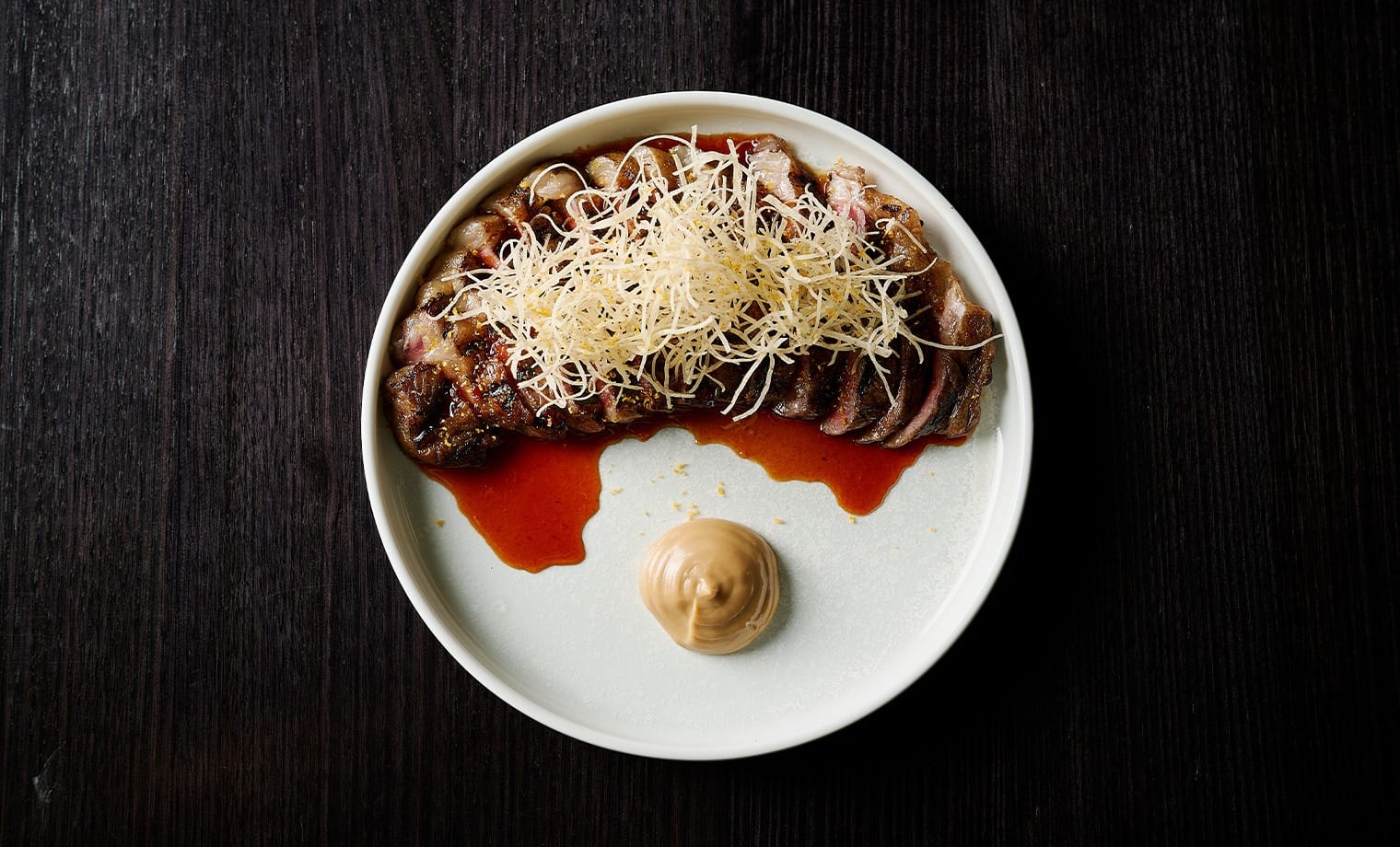 A Salted Egg signature steak dish